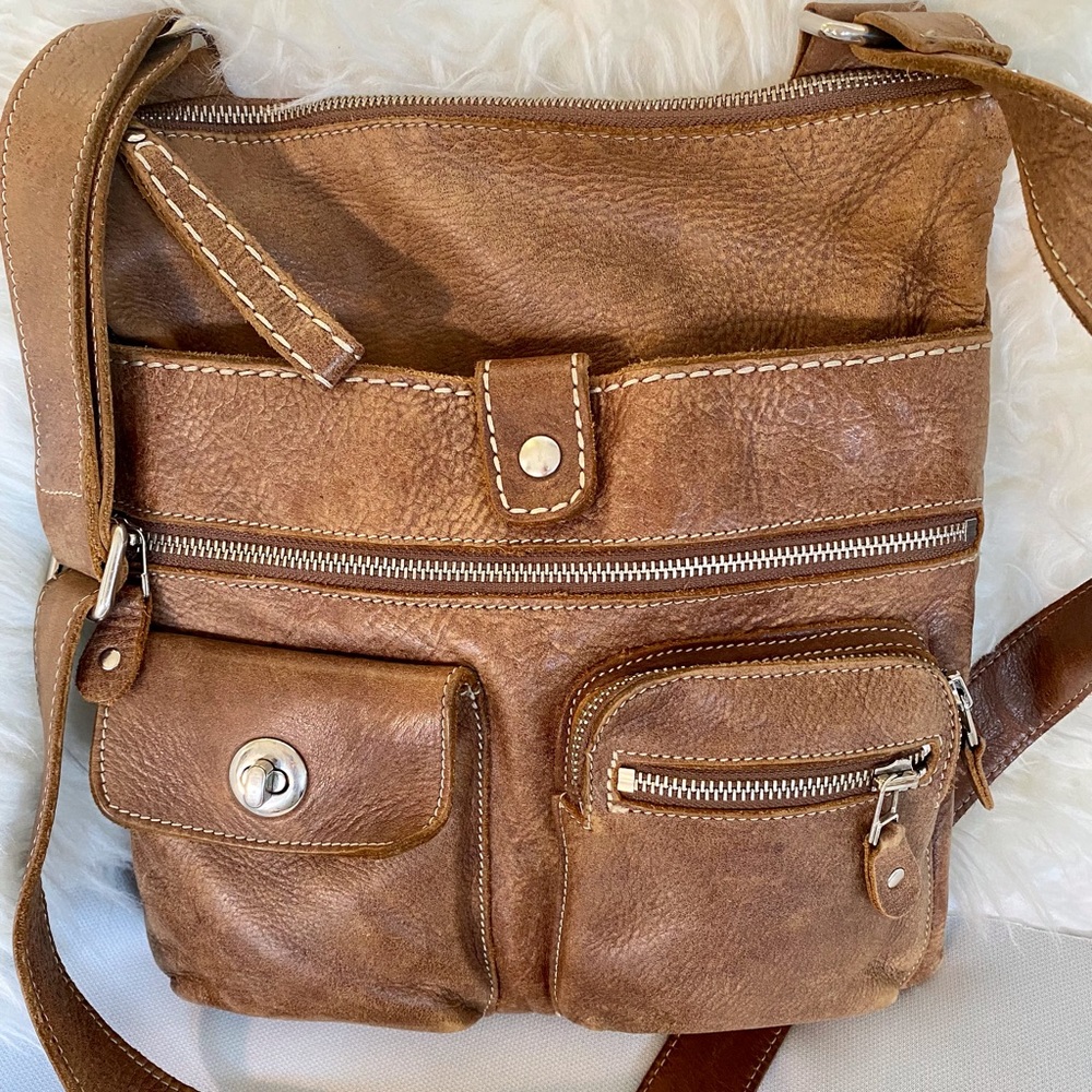 Vintage Roots leather Venetian Village bag.